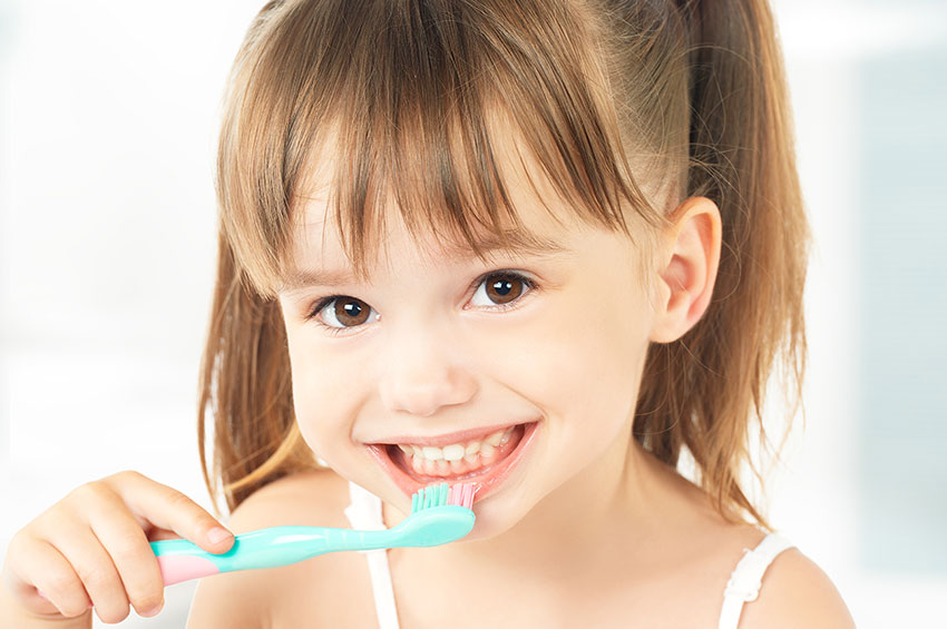 Child Cleaning Teeth