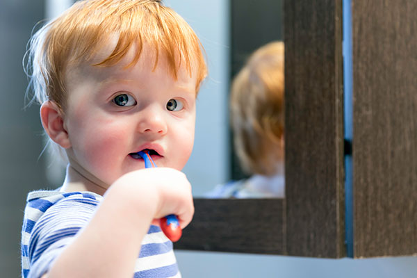Child Brushing Teeth